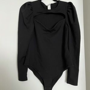 Super cute, comfortable black bodysuit. Worn once.